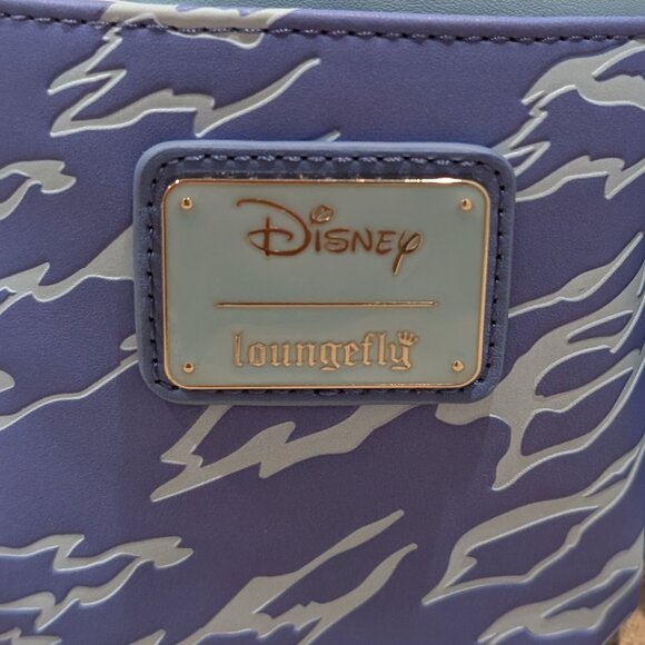 Loungfly Pinocchio Exclusive Raft Monstro Lenticular Mini Backpack